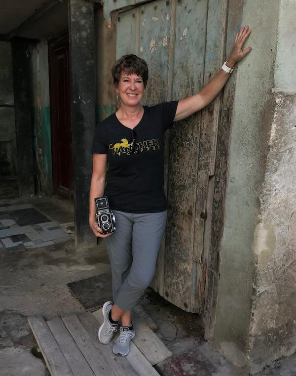 Adair Oesterle, holding a medium format film camera